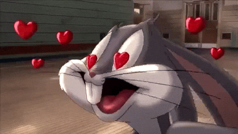 bug bunny, el personaje de dibujos animados con corazones que le salen de los ojos y en actitud enamorada